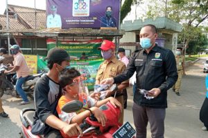HUT Kabupaten Tangerang KNPI Bagikan Masker dan Hand Sanitizer
