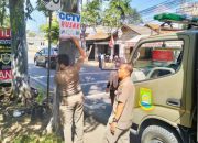 Satpol PP Kota Tangerang Tertibkan Spanduk Liar di Jalan Protokol