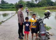 Air Mulai Surut, Polsek Pasar Kemis Pantau Usai Hujan Deras